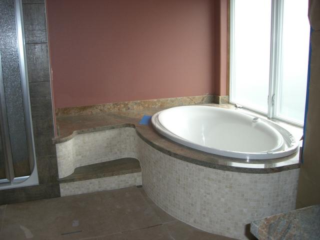 Corner soaker tub in the bathroom
